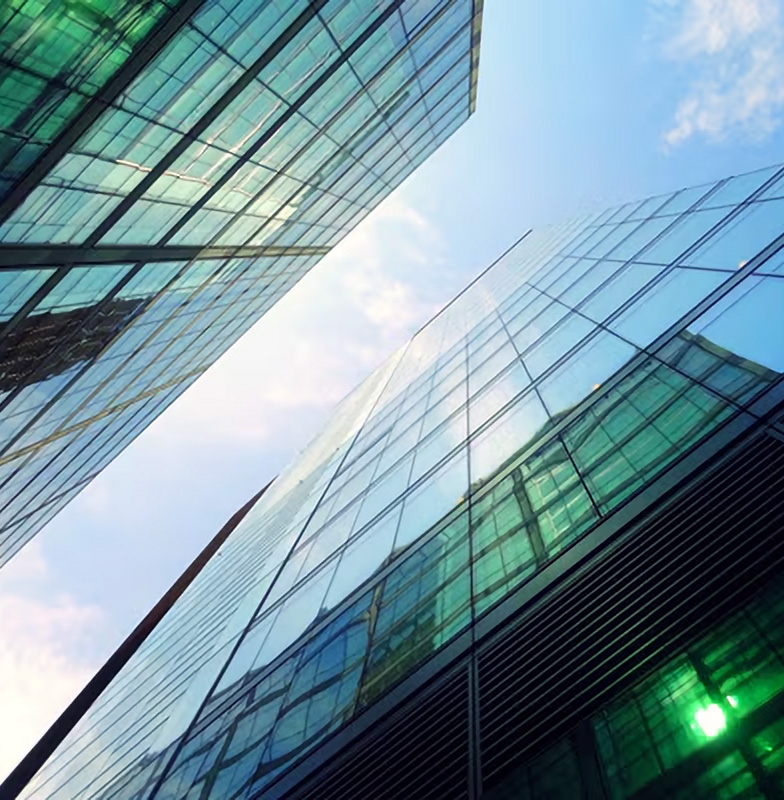 Low-angle shot of a group of high-rise commercial buildings